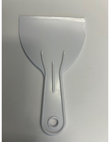 Spatule pour l'écrémage du miel
